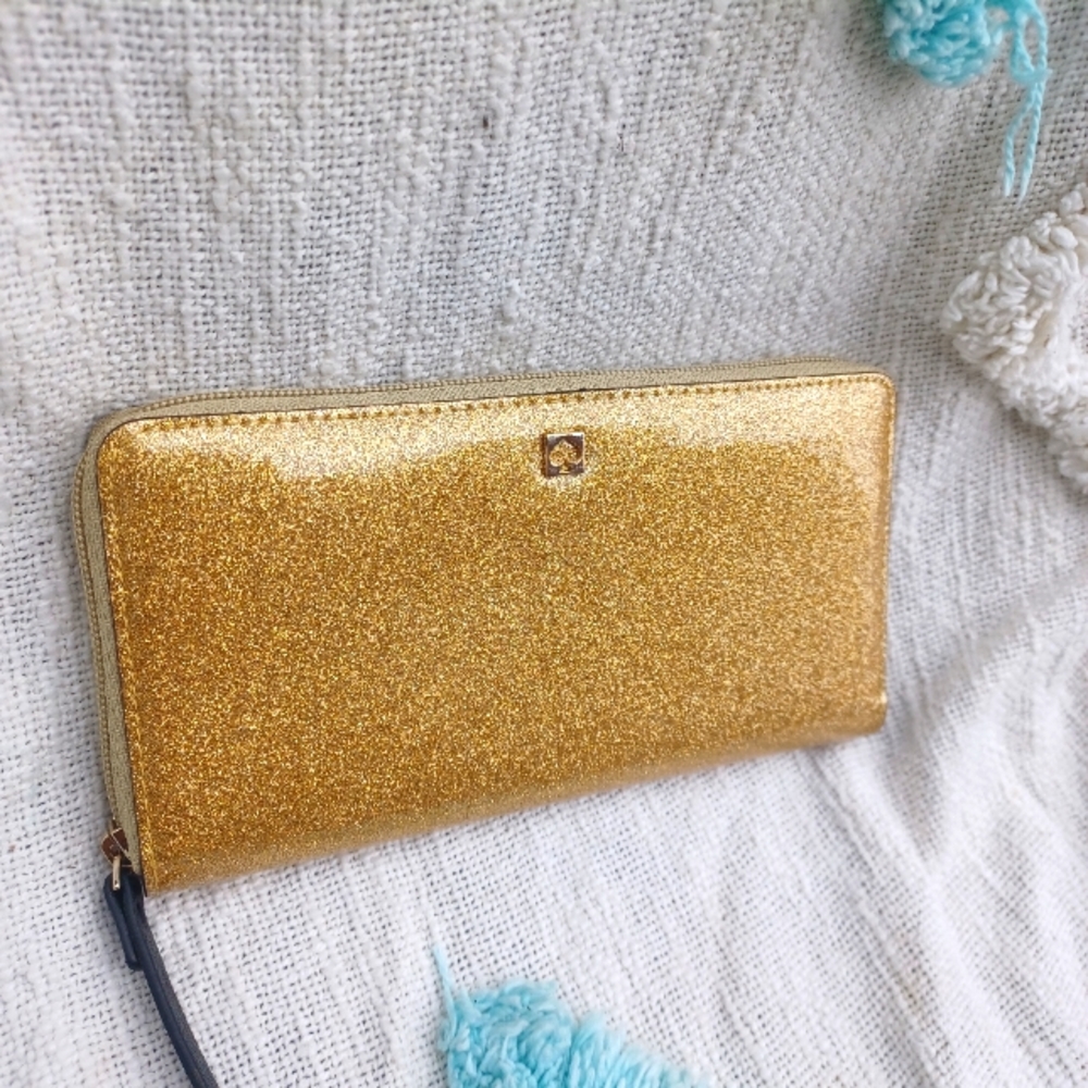 Kate Spade Gold Sparkle Wallet Never used Beautiful and still has all inserts